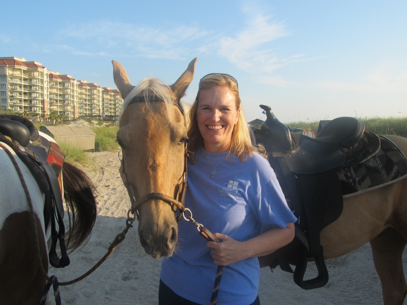Amanda Roeschke horseback riding at Amelia Island, FL
