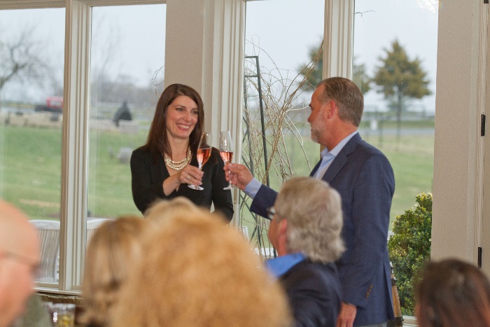 Angie and Joel toast at Salamander Resort, VA.